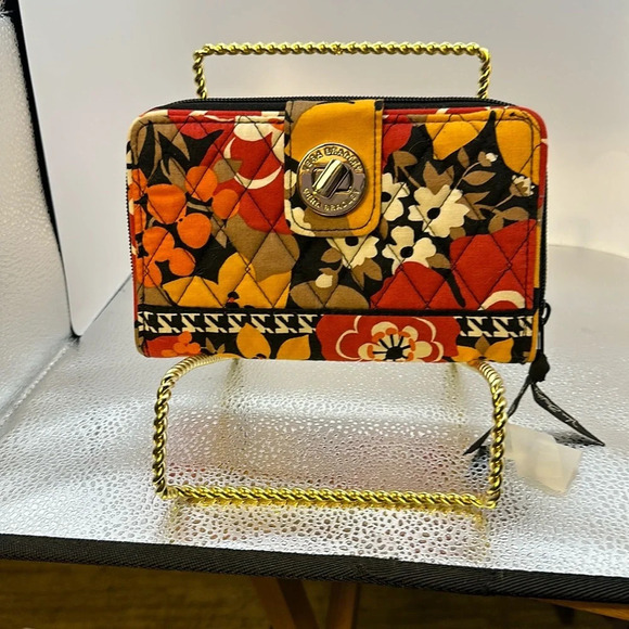 Vera Bradley Handbags - New without tags Vera Bradley billfold in excellent condition. Beautiful colors.